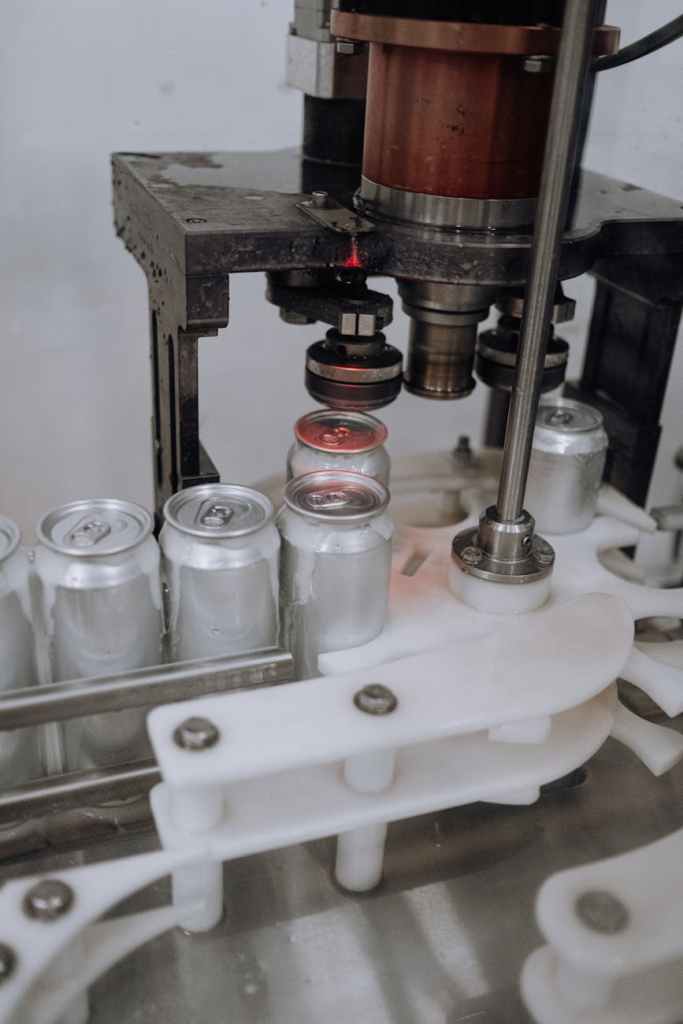 aluminum cans being manufactured